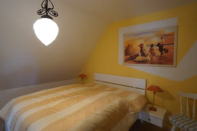 Ferien unterm Reetdach Whg 01