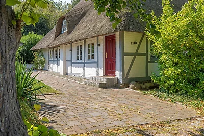 Weisse Reetdachkate Wohnung 1