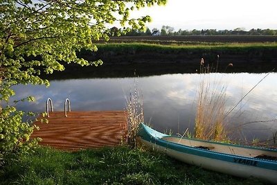 Bauernhaus am Fluss