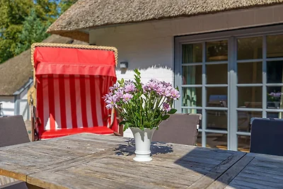 Weisse Reetdachkate Wohnung 1