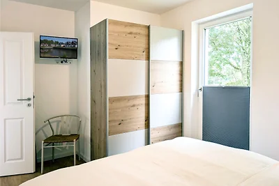 Ferienwohnung Schilfhaus 96a