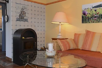 Ferien unterm Reetdach Whg 02