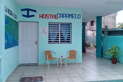 Hostal Caramelo - La Negra y Elier