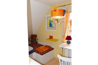 Ferien unterm Reetdach Whg 01