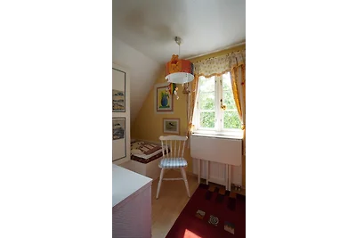 Ferien unterm Reetdach Whg 01