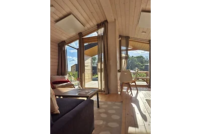Modernes Tiny House mit Naturblick