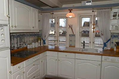 Ferien unterm Reetdach Whg 01