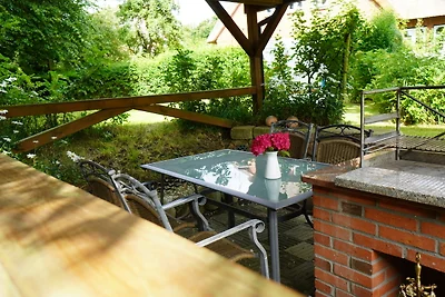 Ferien unterm Reetdach Whg 03