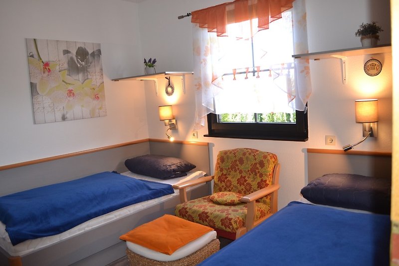 Schafzimmer mit 2 auseinander stehenden Betten