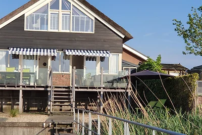 "HOME" 258, direct am Wasser, Veen.