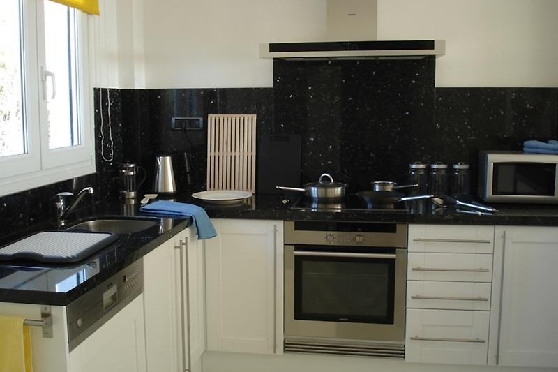 Fully fitted and equipped modern kitchen