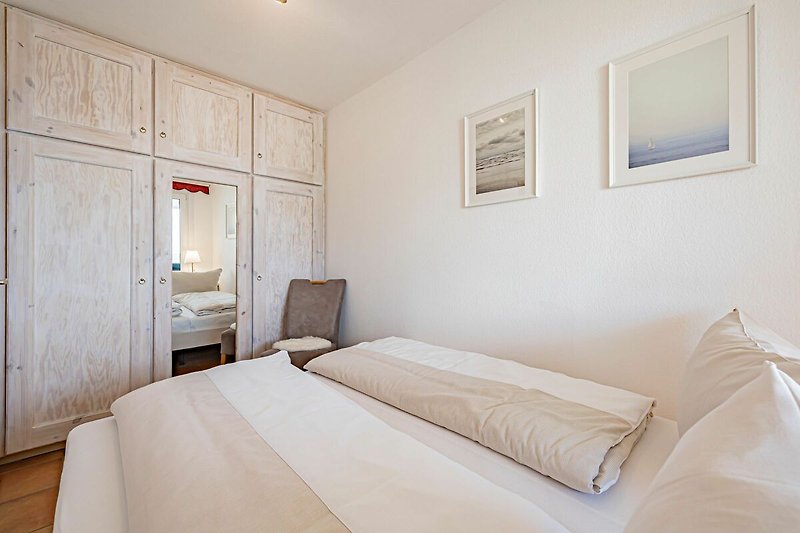 Bright bedroom with sea views