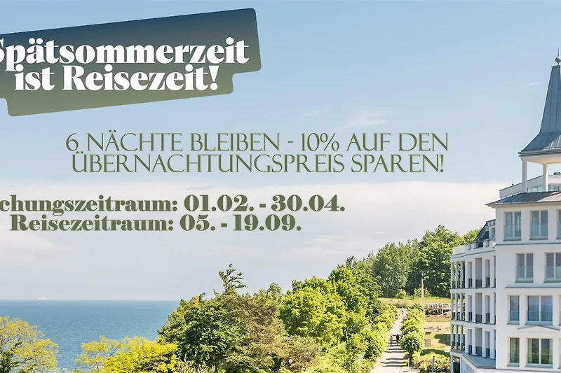 Repräsentatives Anwesen mit eindrucksvoller Fassade und Parkzugang.