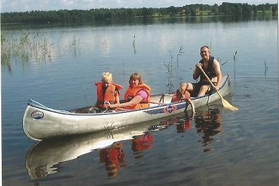 Maison Lac Bolmen avec 2 bateaux