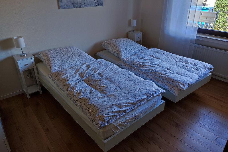 Doppelschlafzimmer mit EInzelbetten