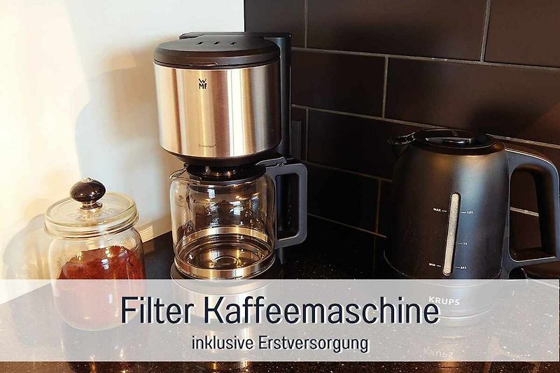 Kaffeemaschine inklusive Erstversorgung - stilvolles Kochen im modernen Ambiente.