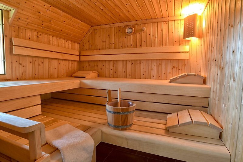 Nach einem langen Tag können Sie sich in der hauseigenen Sauna entspannen.