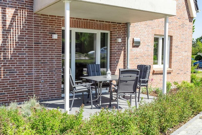 Villa Dornkamp - Wohnung 1 - Deine Ferien - überdachte Terrasse