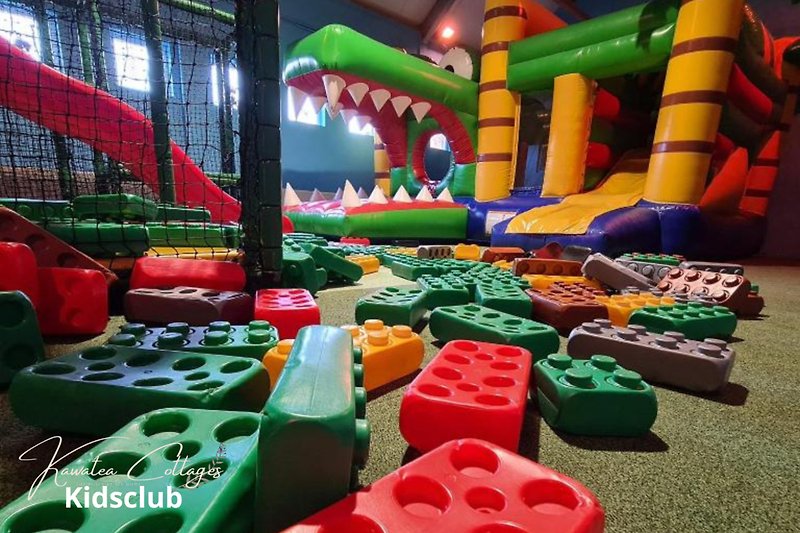 Indoor playground with inflatable bouncy castle