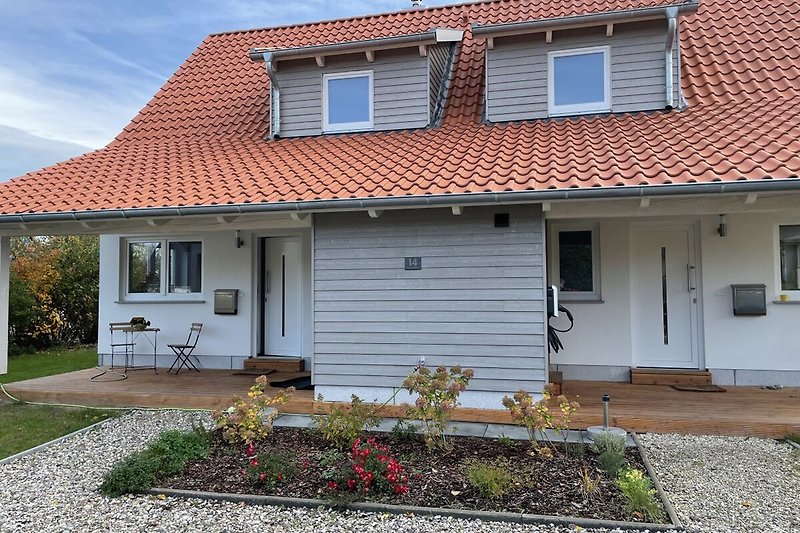 Ferienhaus Kranichblick - links Freiheit / rechts Glück