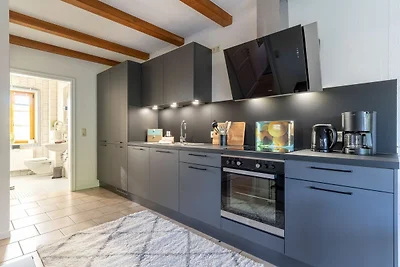 Landhaus Liebheimelig Ferienwohnung "Wellenre...
