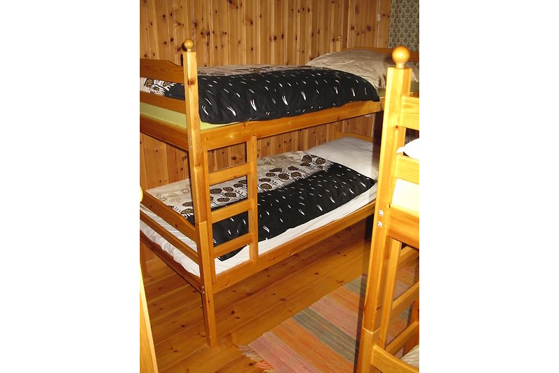 Schlafzimmer mit Hochbetten
