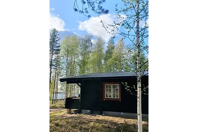 Cabina di legno sul lago Kesjön