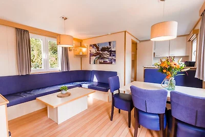 Chalet mit überdachter Terrasse und umzäuntem...