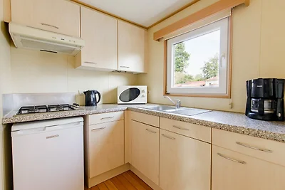 Chalet mit überdachter Terrasse und umzäuntem...