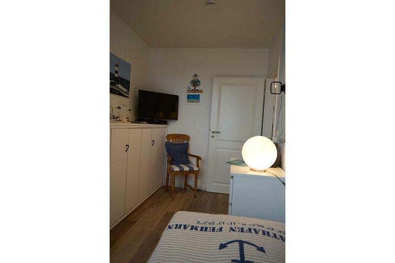 Schrankbett im 2. Schlafzimmer der Ferienwohnung auf Fehmarn