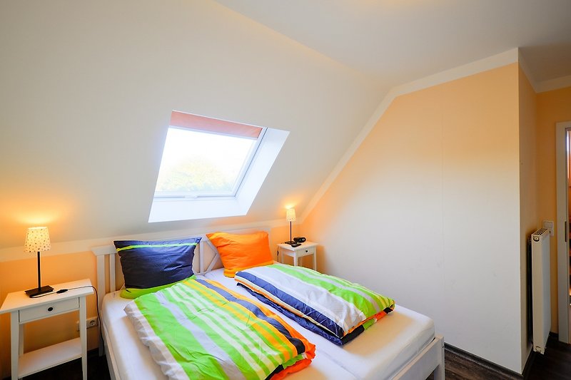 2. Schlafzimmer in dem Ferienhaus für 12 Personen in Burg auf Fehmarn
