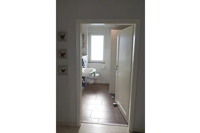 Inselblume 22 - Ferienhaus mit Garten und Hun...