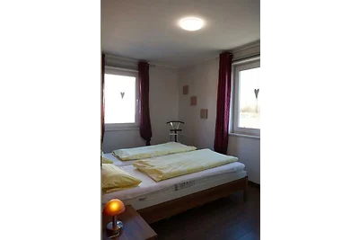 Inselblume 22 - Ferienhaus mit Garten und Hun...