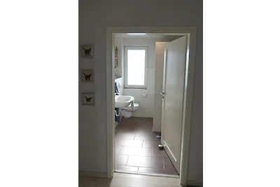 Inselblume 22 - Ferienhaus mit Garten und Hun...