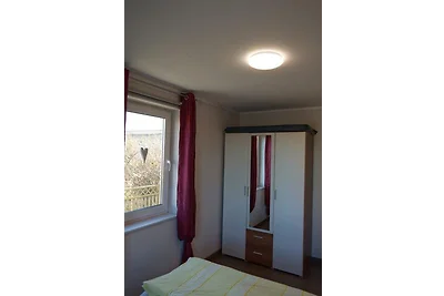 Inselblume 22 - Ferienhaus mit Garten und Hun...