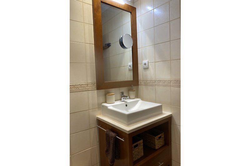 Second bathroom with toilet and bidet