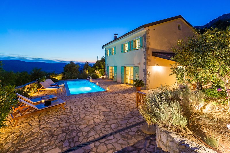 Villa Tribalj sundeck terrace with heated pool and amazing panoramic view