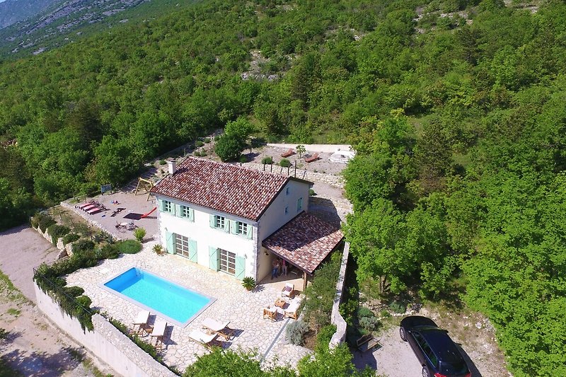 Villa Tribalj Property with 2 private parking lots located just 10 minutes from the highway and the beach in privacy