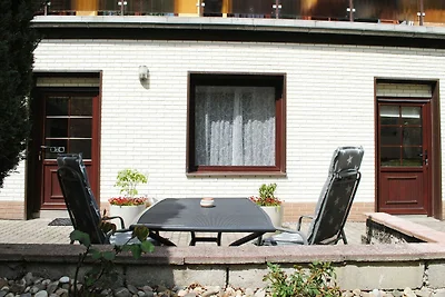 F-1106 Ferienhus Baabe FeWo 01: Terrasse und ...