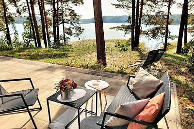 JW MAZURY Ferienhaus Żuraw mit Steg