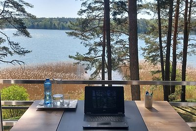 JW MAZURY Ferienhaus Żuraw mit Steg