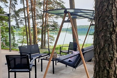 JW MAZURY Ferienhaus Żuraw mit Steg