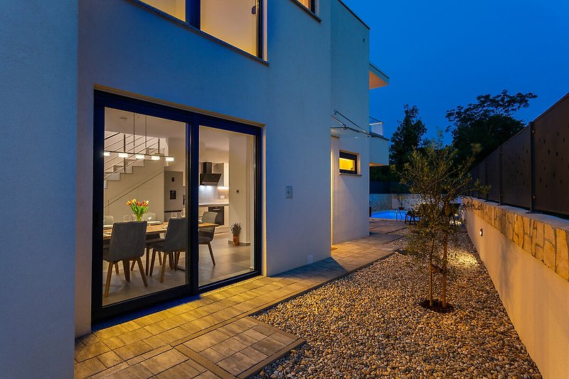 Attractive night exterior for relaxation in the harmonious beauty of the villa.