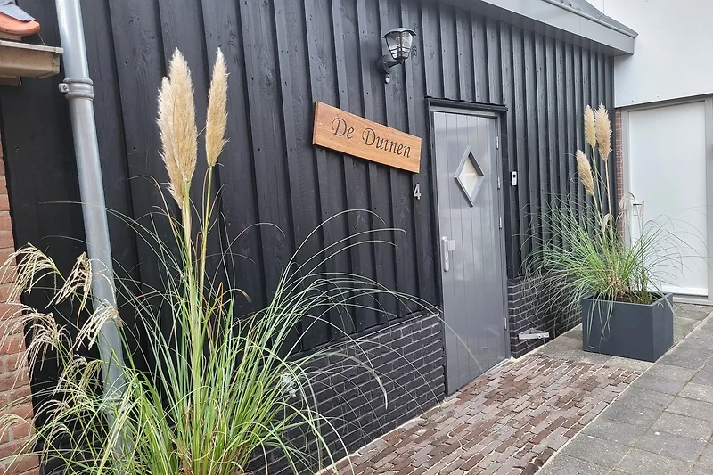Prachtig huis met houten gevel.