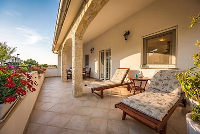 Familienapartment Stinjan mit Gartenblick