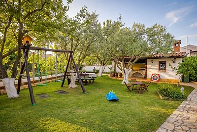 Familienapartment Stinjan mit Gartenblick