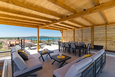 Penthouse Sax mit Meerblick