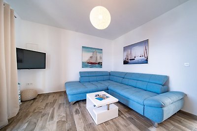 Villa Gulli - Apartment Blue mit Privatstrand