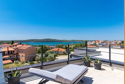 Penthouse Sax mit Meerblick