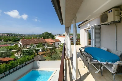 Cozy Apartment Luka with Shared Pool and Gym